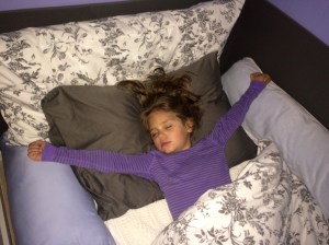 Lily's favorite sleeping position, 'the starfish'